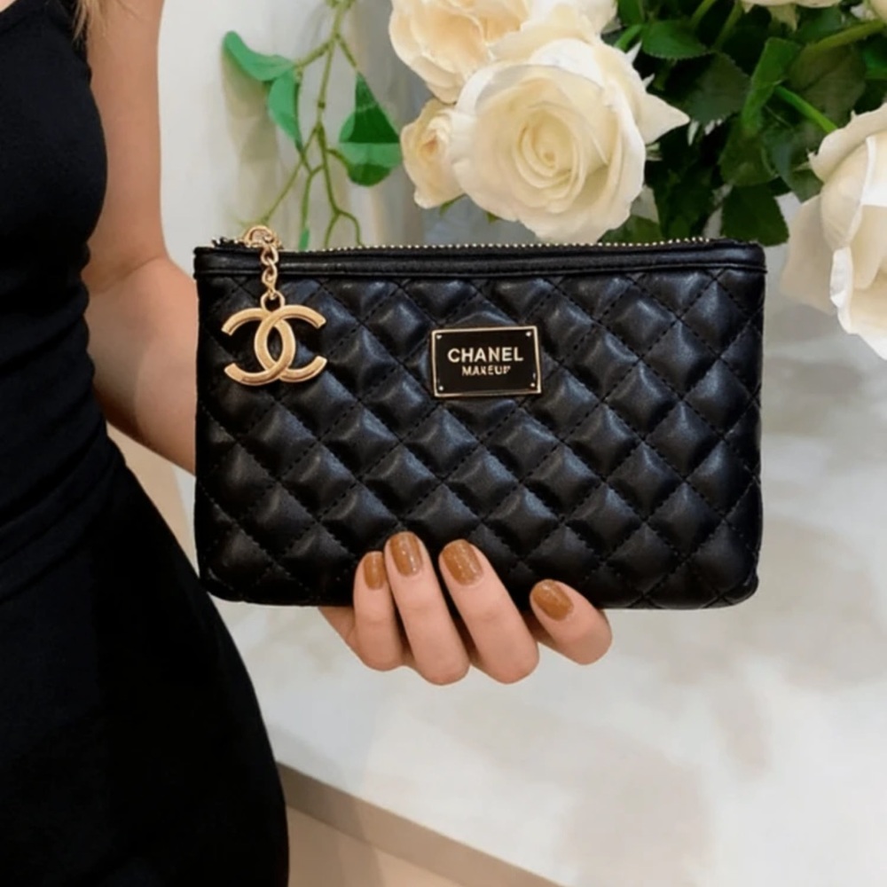 CHANEL Black Quilted Cosmetic Pouch with Gold Charm